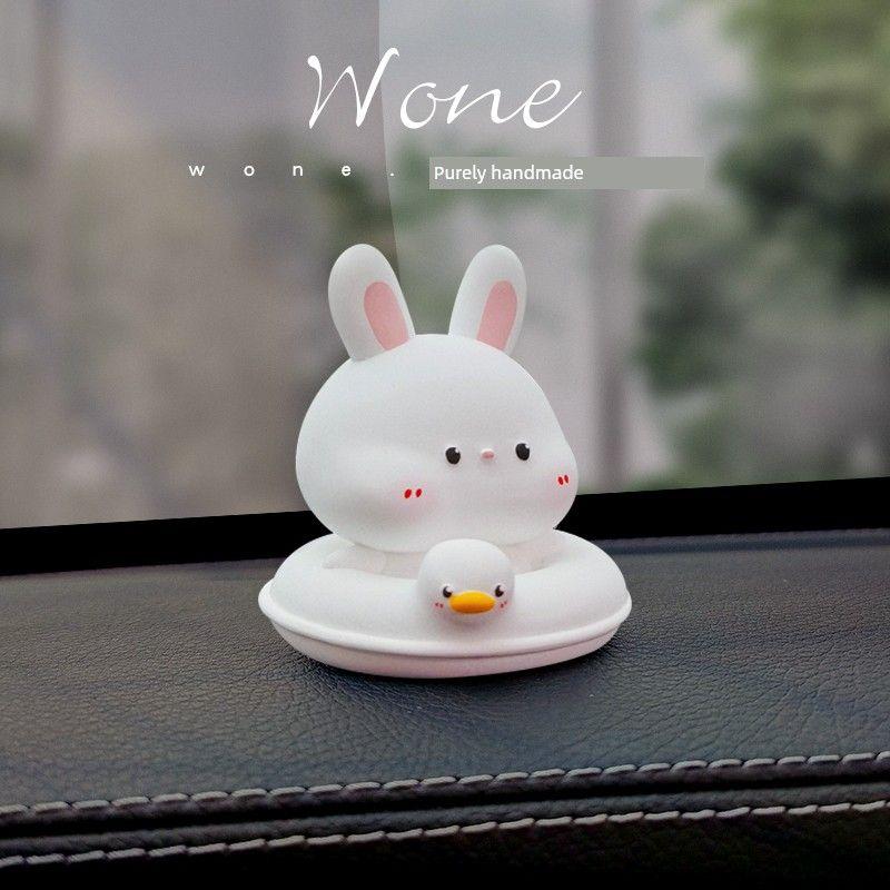 

Original Car Perfume and Aroma Diffuser, Summer Cute Swimming Ring Duck Car Dashboard Ornament, Aroma Stone, Gift for Girls Swimming Ring Bunny Ornament