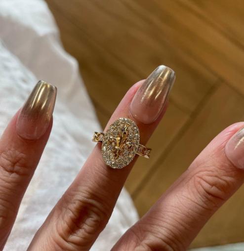 

Stackable lavish gold pavé diamond rings, B; single gold ring with full diamonds. One Size