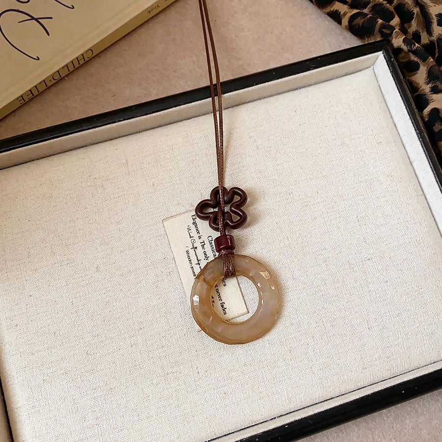 Retro Ethnic Heart Necklace: Wooden Flower Pendant Sweater Chain for Women