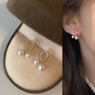 Trova Twisted Pearl Point Stud Earrings