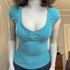 Camiseta de Manga Abullonada con Botones Ajustada Estilo Europeo y Americano - Top de Verano Dulce, Picante, Sexy