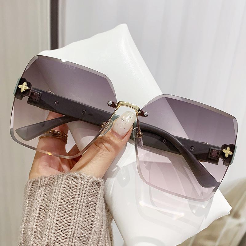 Trendy Unisex Retro Frameless Cut-Edge Sunglasses with Large UV Protective Lenses