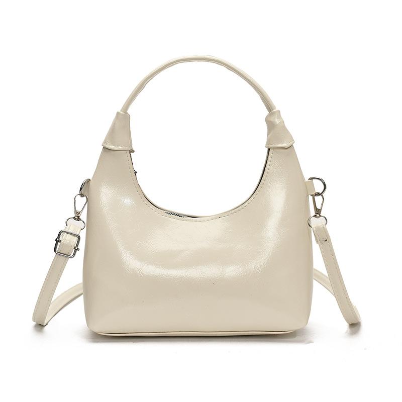 

Textured foreign style commuter women s new fashion bow one-shoulder armpit crossbody bag of the season No pendant model білий
