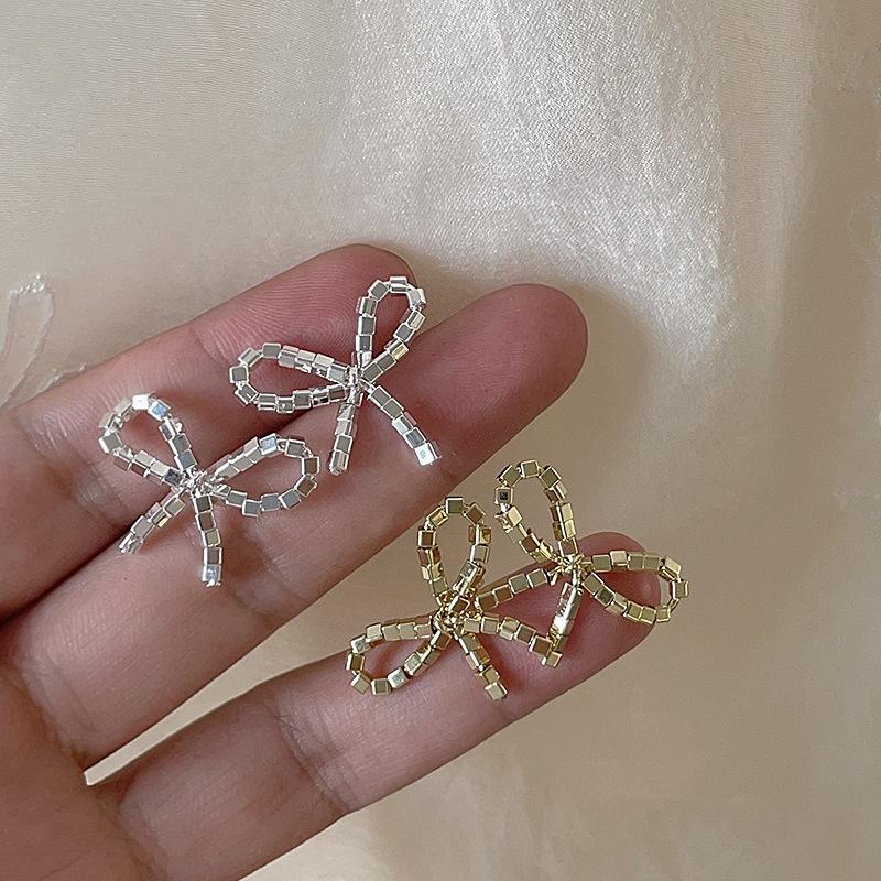 Sparkling Metal Bow Earrings Women'S Niche Design Personality Simple Temperament Versatile Fashion Earrings