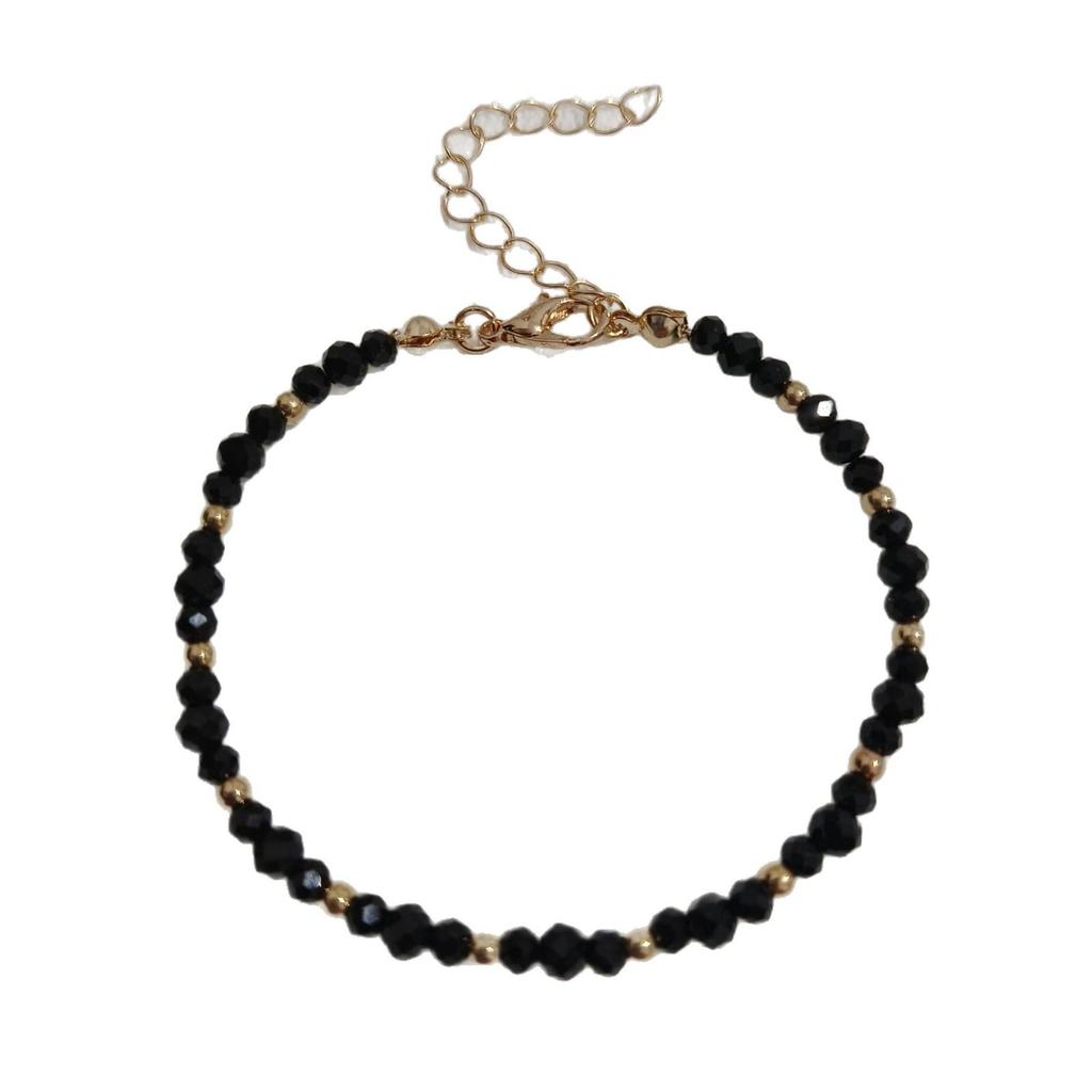 Nouvelle arrivee: Ensemble collier et bracelet faits main en perles de cristal noir pour femmes avec perles dorées - Élégant, Polyvalent, Style Célébrité