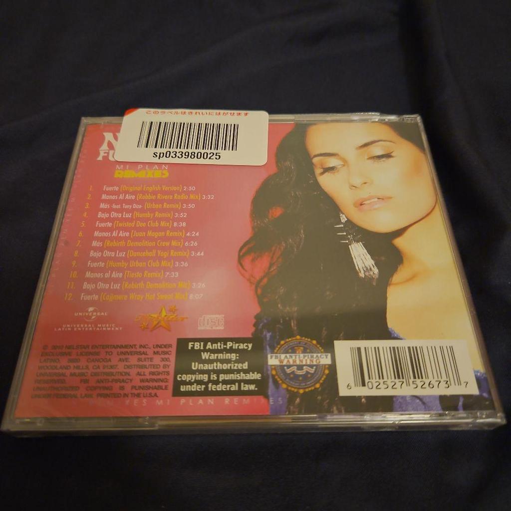 [USED] Nelly Furtado MI PLAN REMIXES