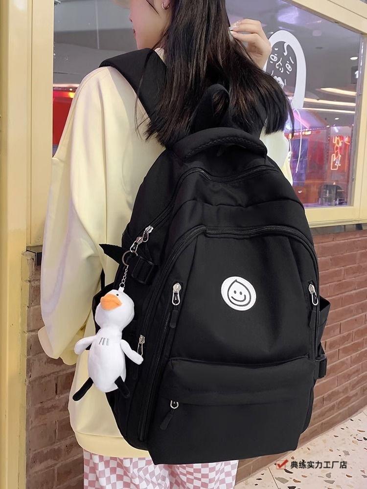 School bag Large capacity computer bag Backpack Boys and girls University campus Simple high junior high school students High value handsome