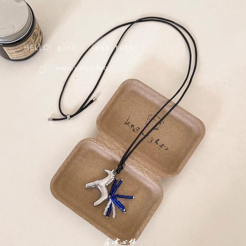 2025 Retro Red Drip Glaze Pony Pendant Necklace: Elegant Women's Long Sweater Chain Accessory