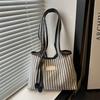 Large capacity tote bag women's new versatile canvas striped commuter shoulder bag women's casual armpit bag