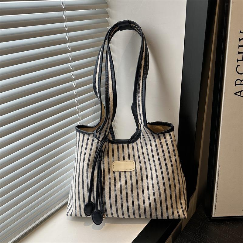 Large capacity tote bag women's new versatile canvas striped commuter shoulder bag women's casual armpit bag