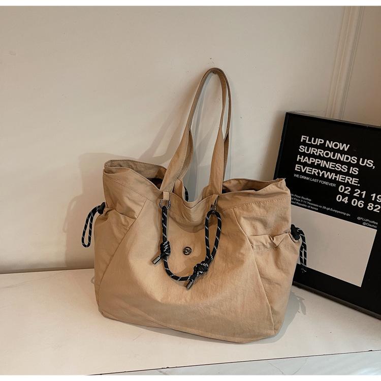 

Fashion casual canvas bag women s 2025 new Korean version large-capacity student class bag commuter tote shoulder bag хаки