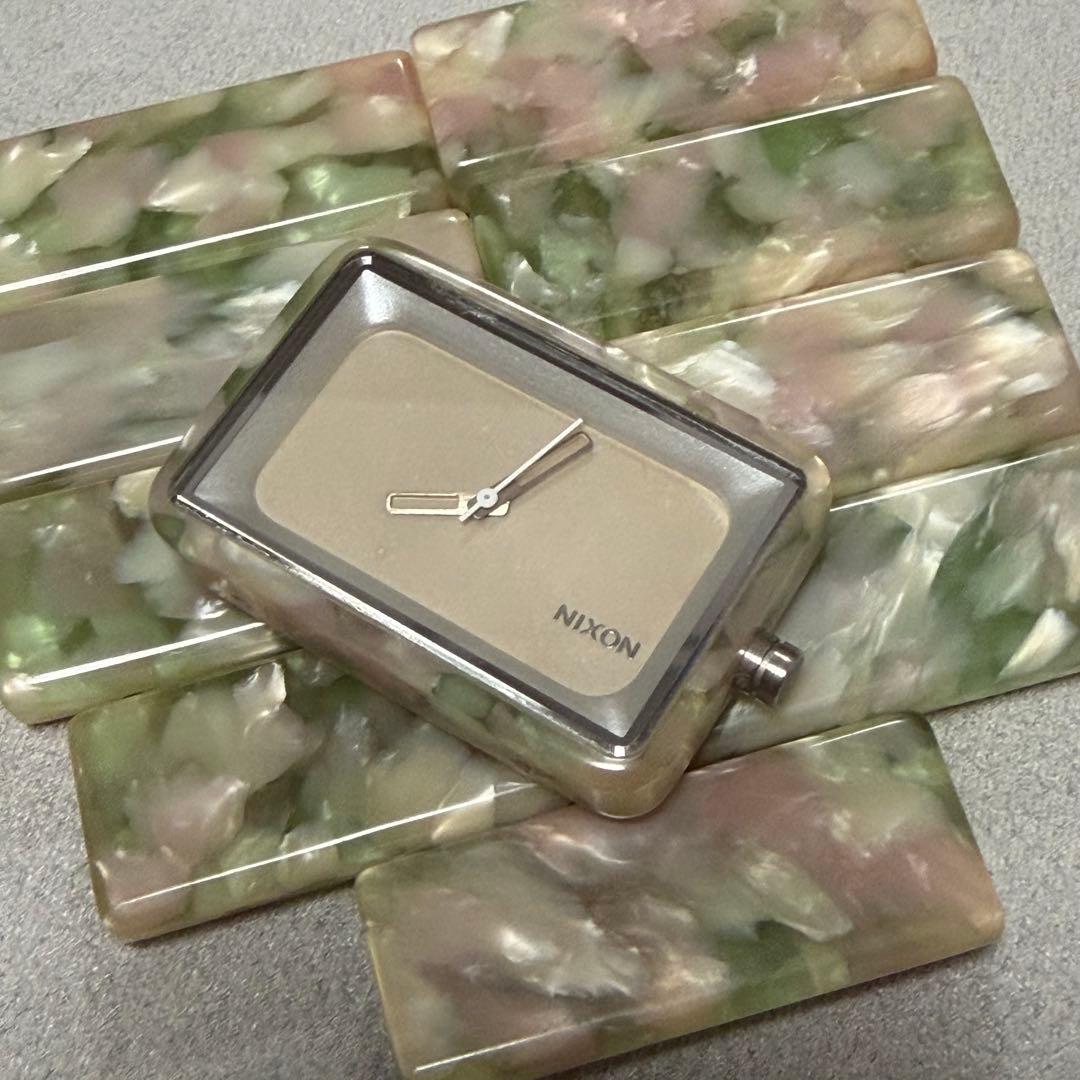 Used nixon vega mint jelly