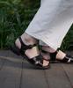 Heenn Shiny Leather Crossover Sandals. Black