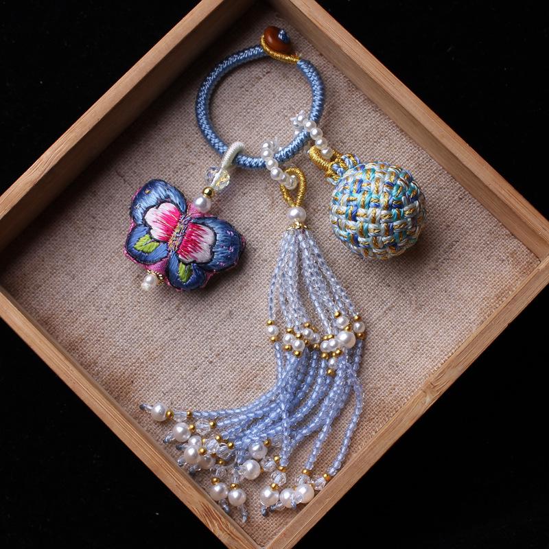 Number 16 Handmade Tassel Accessory with Ball Charm, Pearl, and Spinel Details.