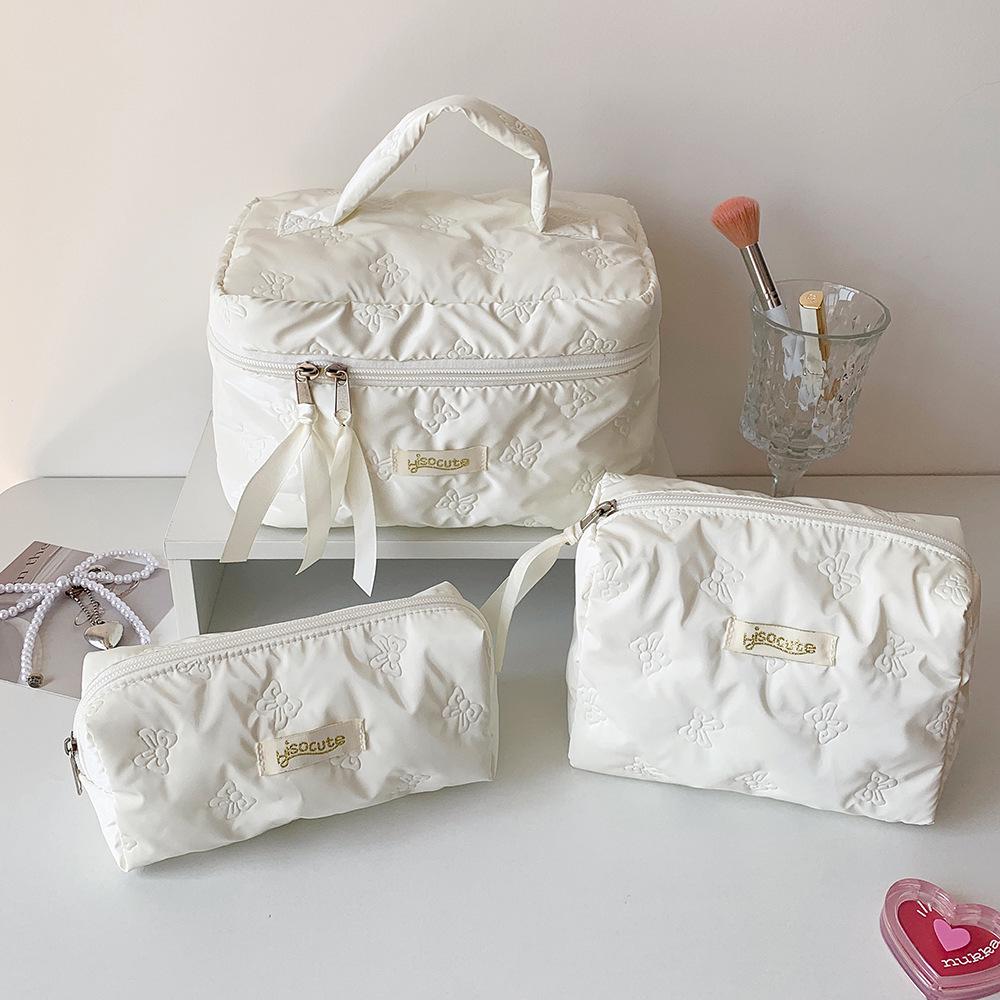 Large Capacity Solid Color Makeup Bag with Ultrasonic Embossing - Desktop Skincare Organizer and Student Toiletry Bag.