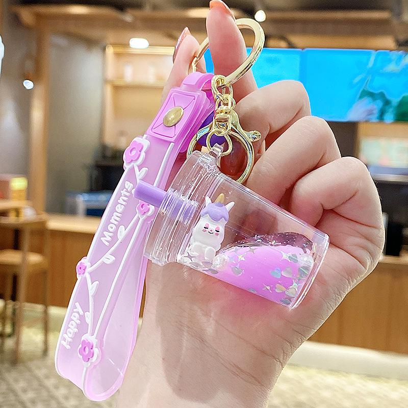 Lila Stern Flüssiger Treibsand Schlüsselanhänger mit Kirschblüten Öl-gefülltem Anhänger - Niedlicher 3D Rucksackanhänger für Frauen