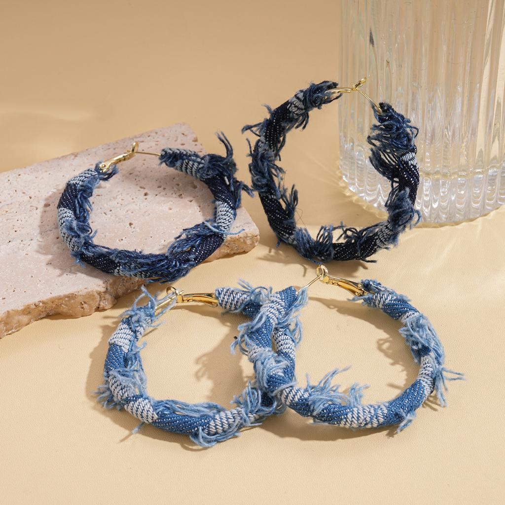 European and American fabric denim woven autumn and winter geometric round silver needle earrings niche retro personalized earrings 