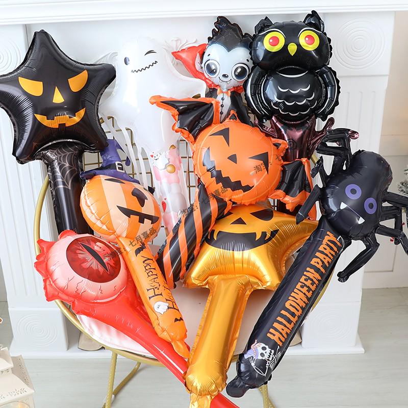 Zestaw zastawy stołowej na imprezę tematyczną Halloween: Obrus dyniowy, Talerzyki i kubki jednorazowe