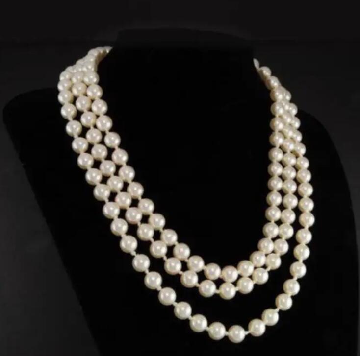 

Ожерелье из трех нитей с настоящим белым жемчугом Жаклин Кеннеди, первая леди, 17–19 дюймов