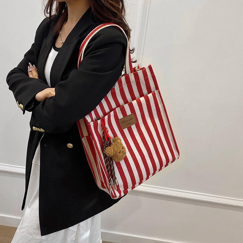 Commuter Large Capacity Leisure 2025 New Personalized Popular Striped Canvas Fashion Crossbody Portable Shoulder Tote Bag