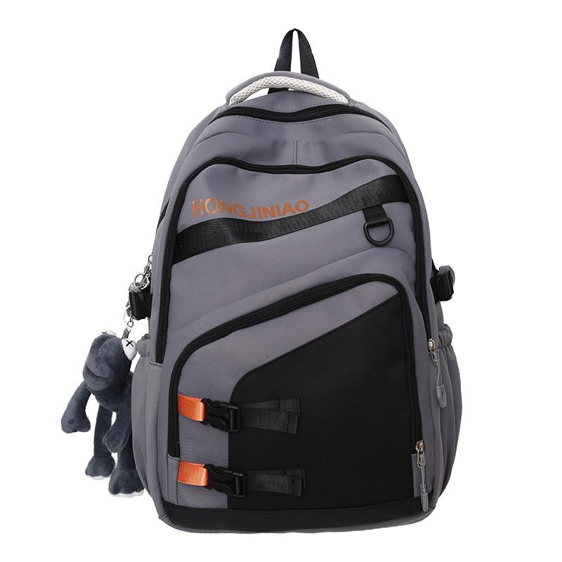 

New super cool backpack, high value and large capacity, primary and secondary school student schoolbag, simple contrasting color spine protection no pendant сірий колір