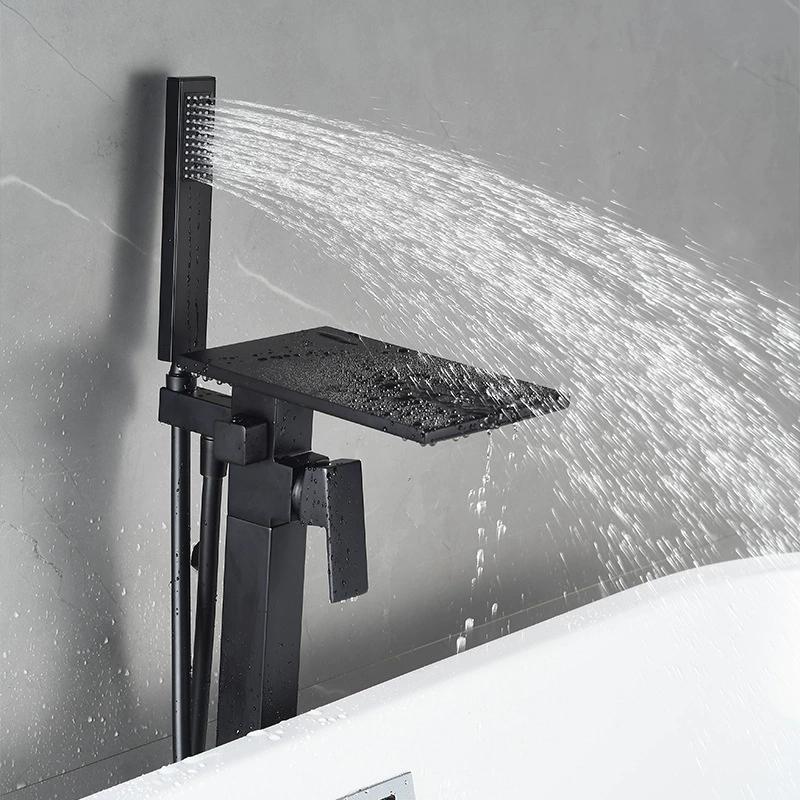 Tuqiu Black Bathroom Bathtub Faucet + Handheld Shower Free Standing Luxury White Waterfall BathTub Mixer Taps Floor Mounted
