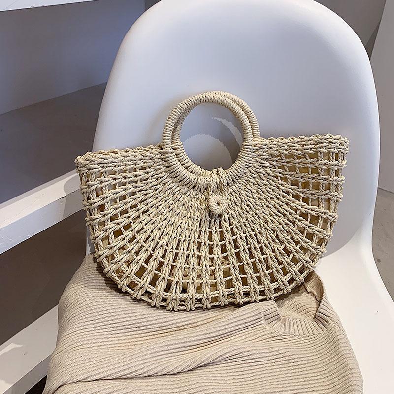 2025 New Straw Woven Bag Bag Round Bucket Hollow Papyrus Woven Bag Korean Version Casual Portable Women's Bag Hand-held Crochet Bag
