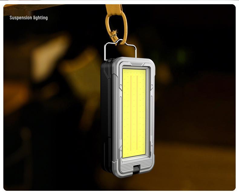 Rechargeable Solar-Powered Portable Work & Camping Light with Emergency Spotlight.