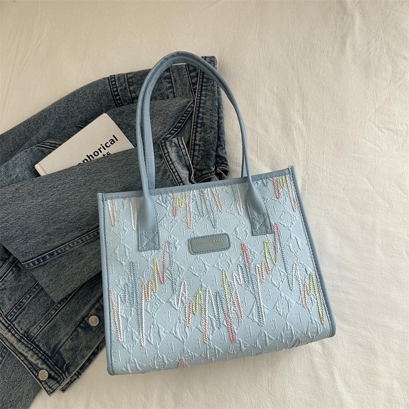 Stylish portable shoulder bag, commuting beautiful large-capacity canvas bag, simple 2025 new women's bag, foreign style tote bag