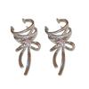 Exquisite Silver Color Bowknot Ribbon Earrings for Women Fashionable and Elegant Metal Hollow Line Ear Cuff Jewelry