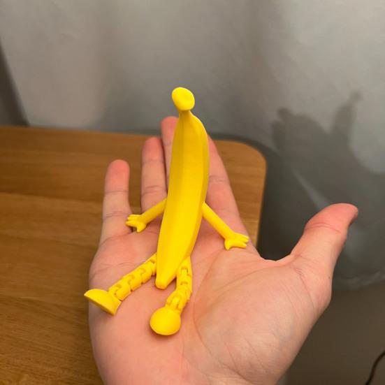 3D Printed Banana Figurine with Articulated Legs Movable Joints Banana Fidget Toy Cartoon Fruit Desktop Decoration Ornament