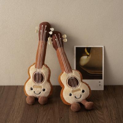 25cm Hübsches Lächelndes Gitarren-Plüschtier Britischer Stil Cartoon Gitarren-Plüschtiere Weiche Puppe Geburtstagsgeschenke Mädchen
