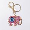 Neuer Schmuck mit blauen Augen - Diamantbesetzter metallisch farbener Elefanten-Schlüsselanhänger, Dämonenaugen-Anhänger