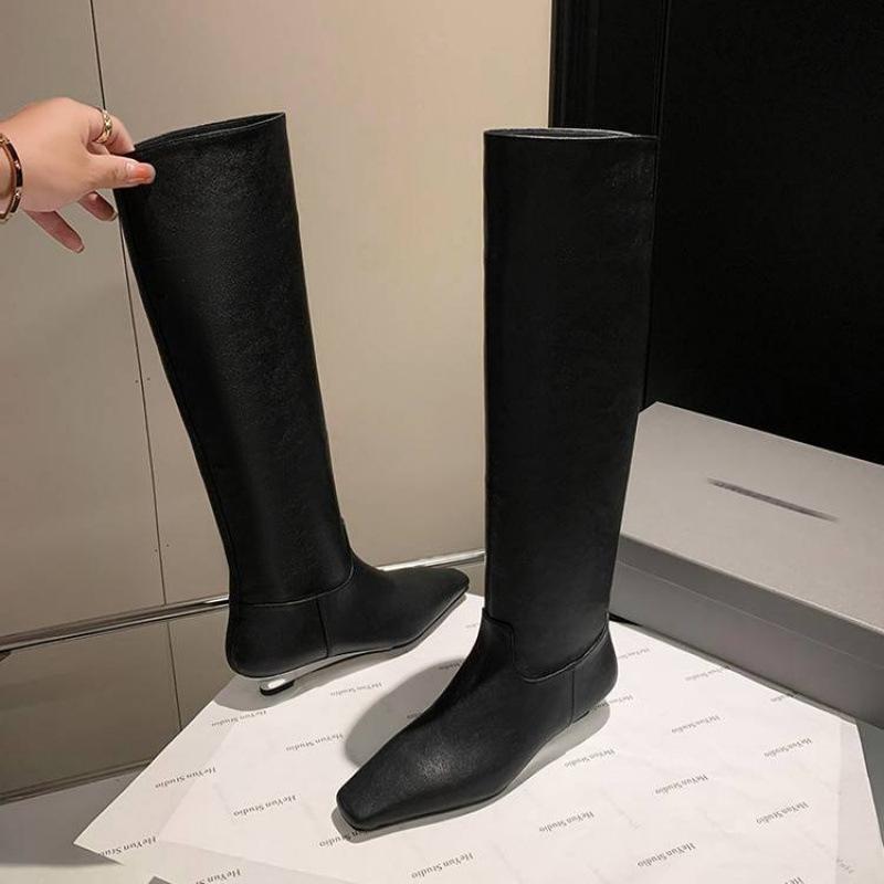 

Autumn and winter women s leather boots solid color leather large size women s boots sleeve cowhide slope heel new pointed fashion high boots 39 чёрный