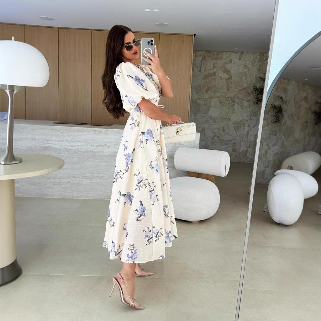 A New Summer Women's Dress with A V-neck, Puffed Sleeves, Printed Ties and A Large Swing