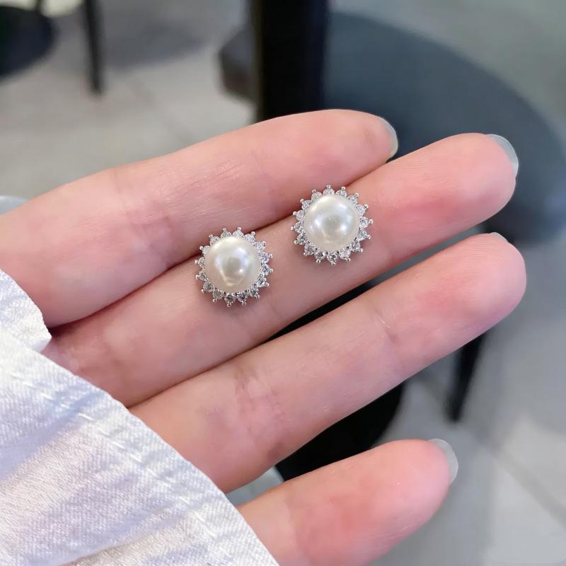 Beixi Silver Sunflower Stud Earrings: S999 Silver Needle, Shell Pearl, Rhinestones, Classic & Elegant Design.