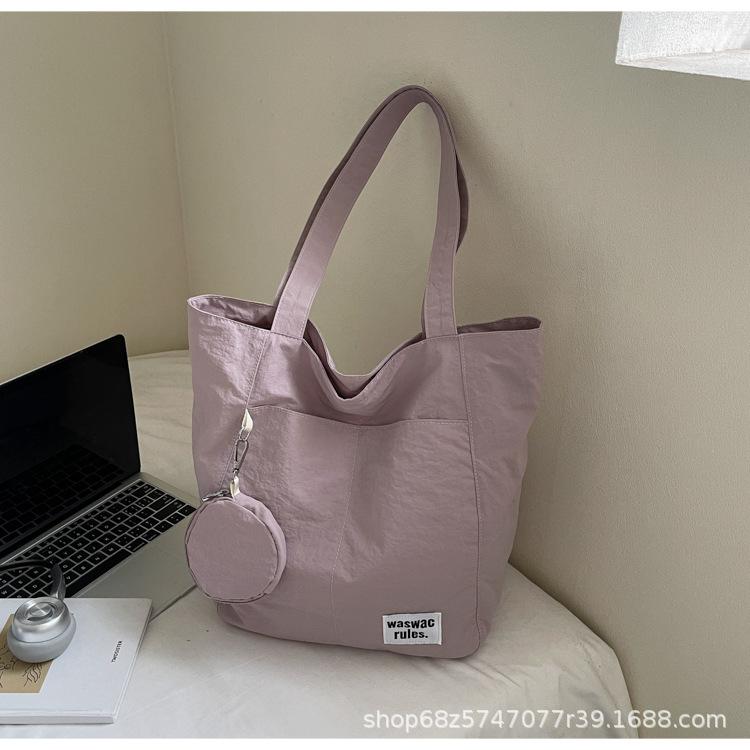Japanese new waterproof nylon casual spring and summer shoulder bag women's design sense large-capacity commuter tote bag