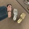 French high-end one-word with golden cool slippers for women's summer wear 2024 new beautiful high-heeled toe sandals