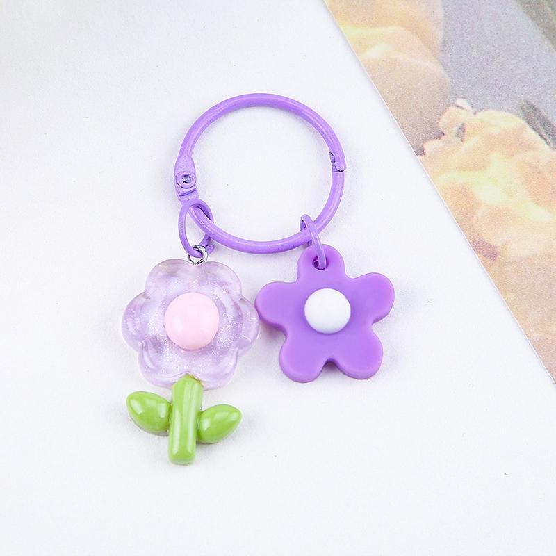 

Брелок-цветок конфетного цвета Брелок-цветок конфетного цвета Подвеска на рюкзак Чехол для наушников Подвесное украшение Аксессуары для автомобильных ключей фиолетовый