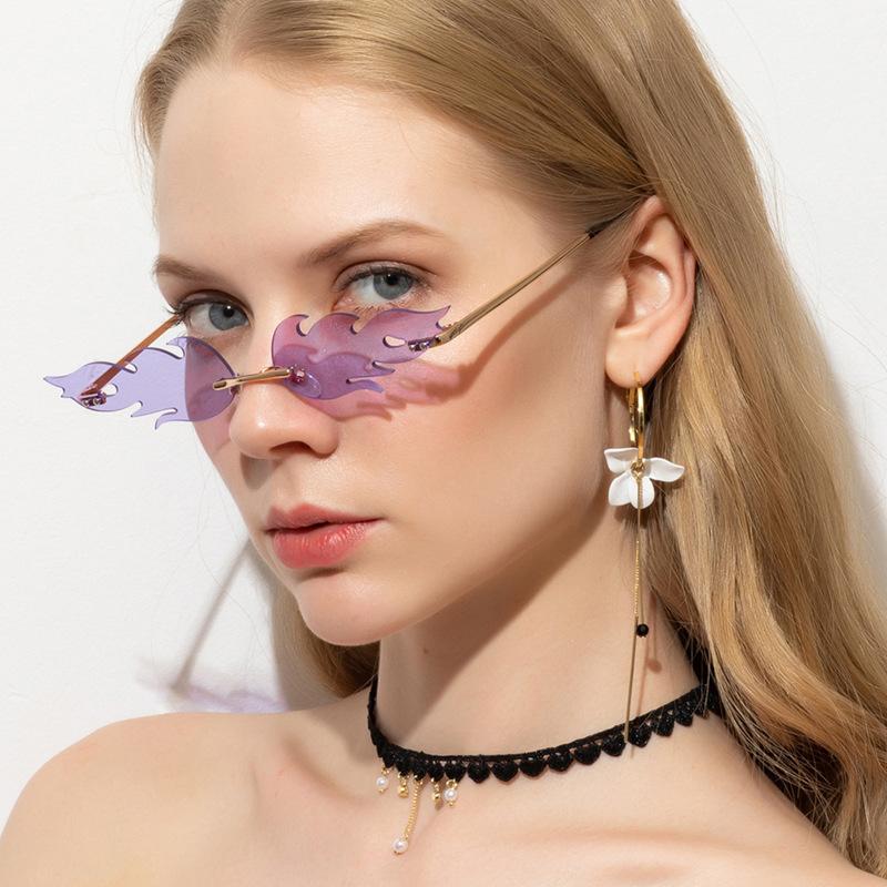 New fashion trend flame sunglasses men's and women's metal frameless street sunglasses European and American narrow-edge glasses S