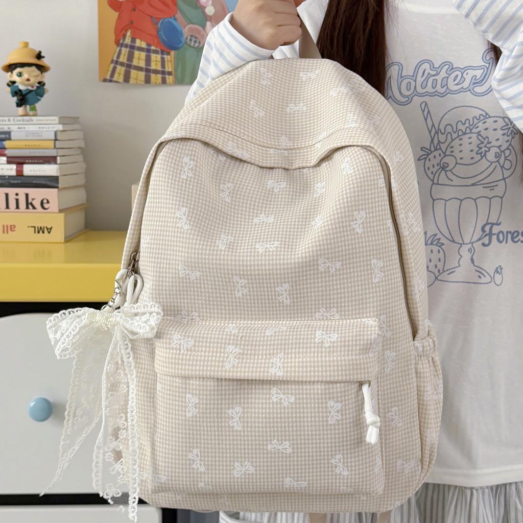 Schoolbag new schoolbag female ins college style backpack large capacity Korean version bow print middle school backpack