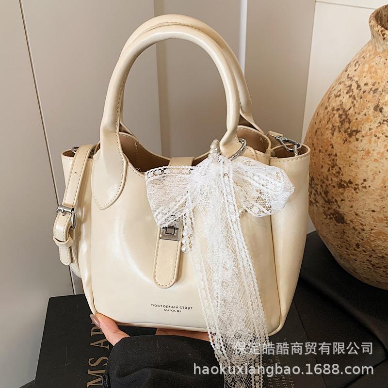 High-end foreign-style portable bucket bag women's 2025 new fashion spring and summer popular Korean version of shoulder messenger bag