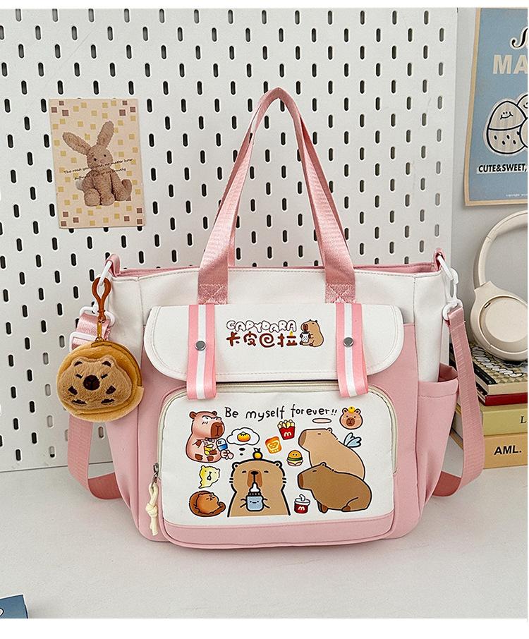 School bag 2025 new large-capacity cartoon multi-compartment high-value school bag Korean version commuting simple make-up bag lightweight backpack