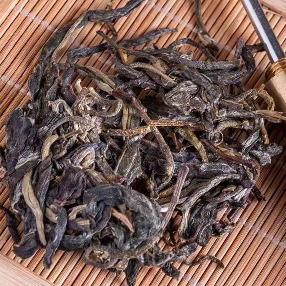 357g Menghai Laobanzhang Yunnan Roher Pu'er Tee Kuchen