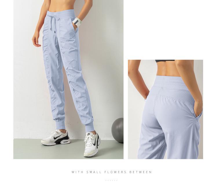 2021 Spring Women's Breathable Loose Fit Nine-Point Running Pants with Pockets
