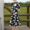 A Fashionable Mid-Sleeved Mid-Length Dress With Floral Prints And A Sexy V-Neck