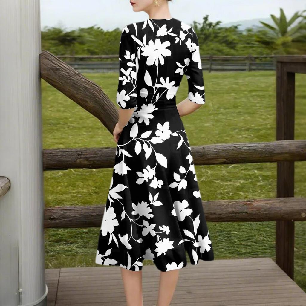 A Fashionable Mid-Sleeved Mid-Length Dress With Floral Prints And A Sexy V-Neck