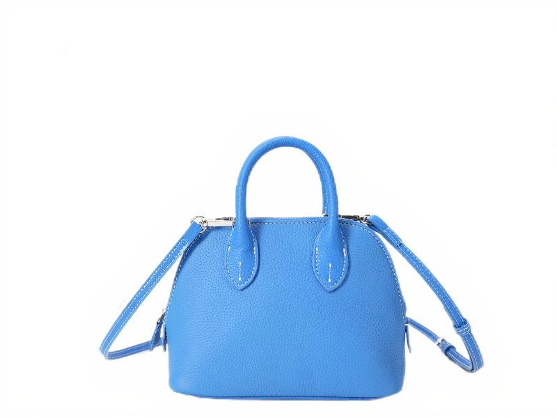 

2025 новая сумка коровья кожа сумка-болид сумка-боулинг для работы универсальная кожаная женская сумка премиальная сумка-ракушка 19*8*14cm синий