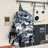 Schoolbag1011 New Large Capacity Graffiti Trendy Cool Leisure Travel Backpack Lightweight Computer Bag Middle and High School Student Backpack