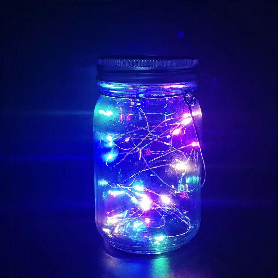Rainproof Solar Mason Jar Wish Light for Garden, Balcony, and Villa Decor.